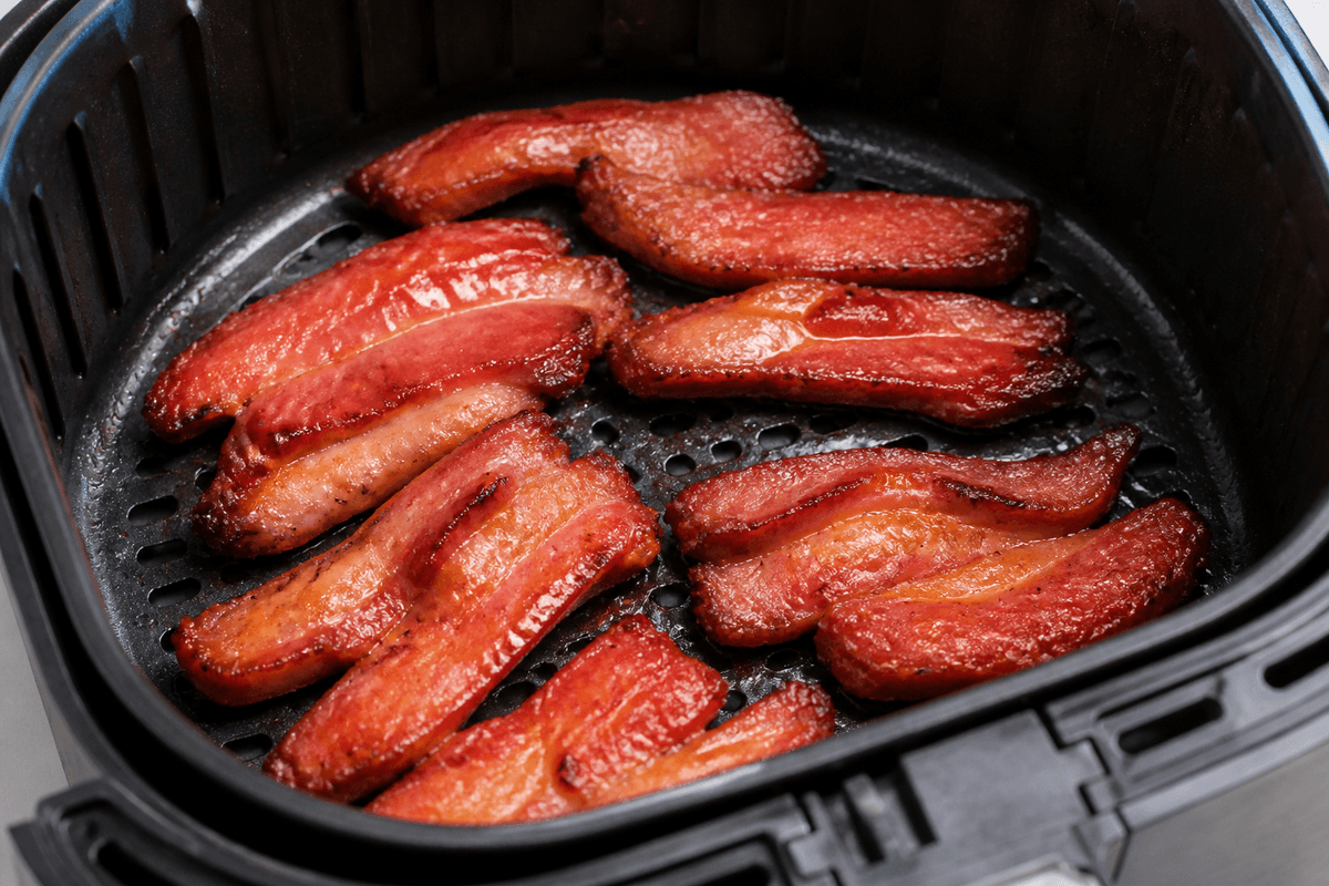 Char siu pork strips in the air fryer basket