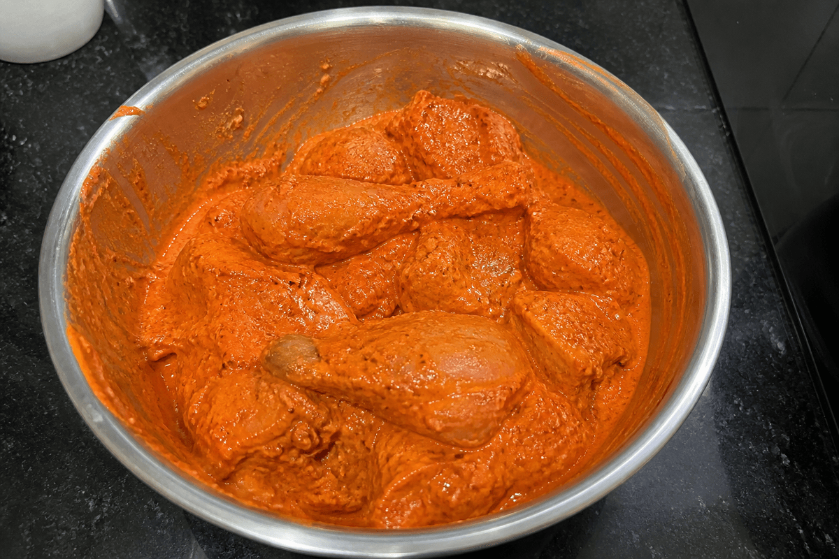 Chicken in red tandoori yogurt marinade