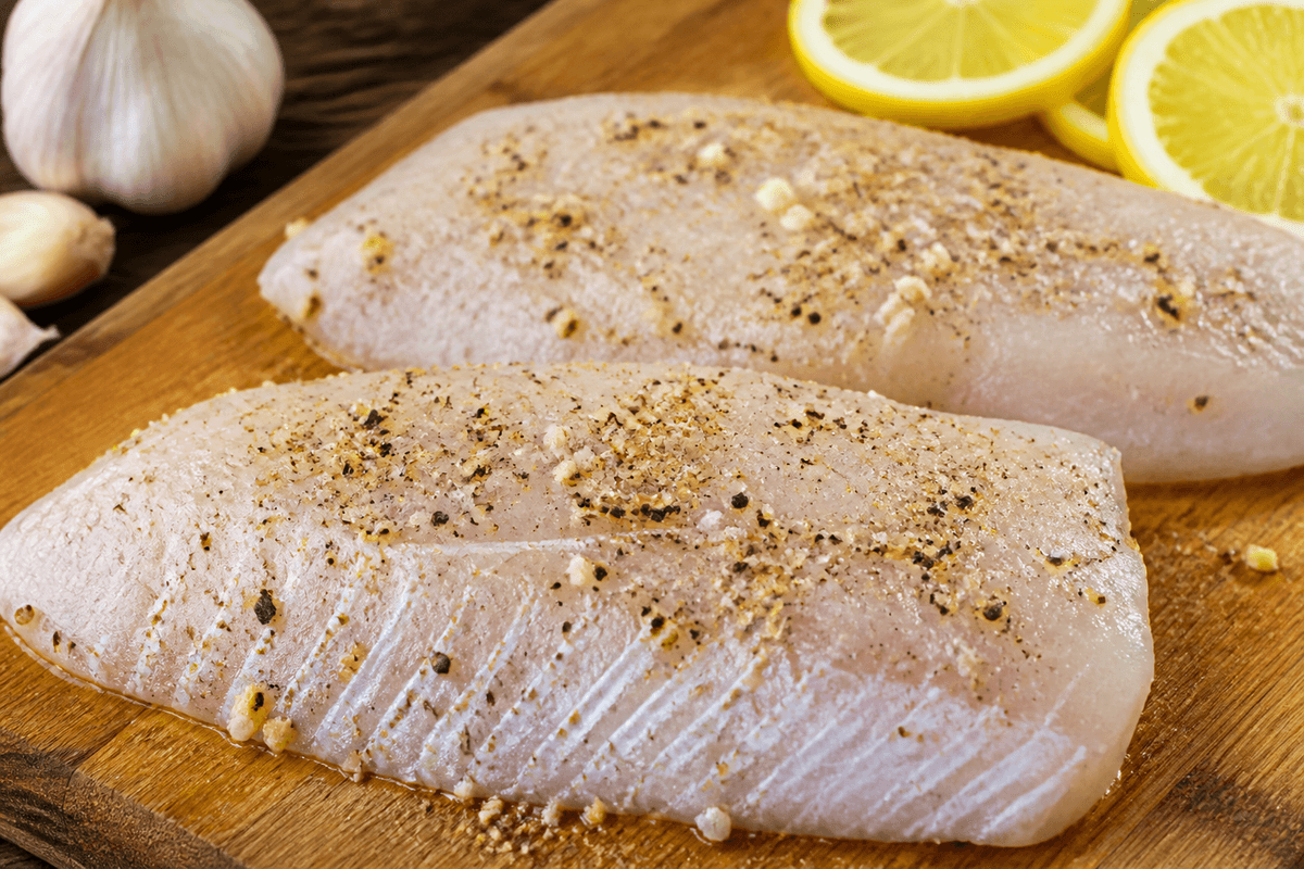 White fish fillets seasoned with garlic and lemon pepper