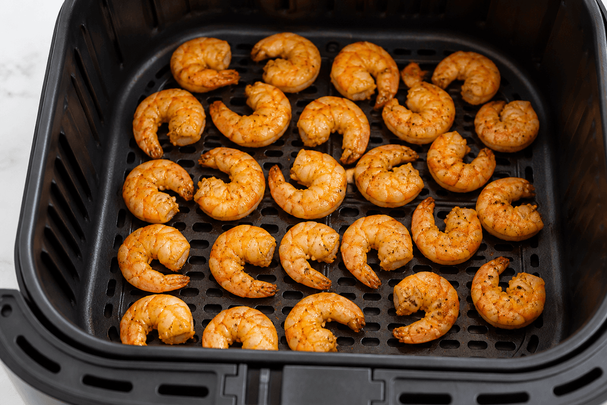 Shrimp in a single layer in the air fryer basket